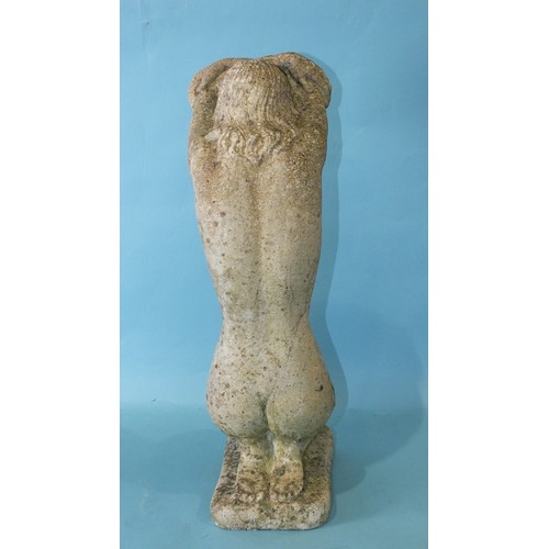 128 - A small cast concrete garden ornament in the form of a kneeling naked female figure with her arms fo... 