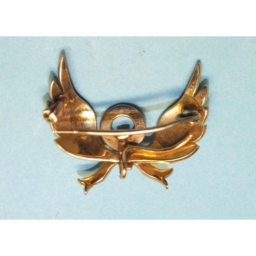 291 - A Victorian gold brooch in the form of wings and bow set seed pearls, (with hook for pendant at back... 