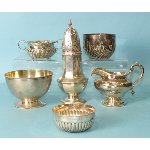 524 - A modern octagonal sugar caster, four sugar bowls and a cream jug, various dates and makers, ___24oz... 