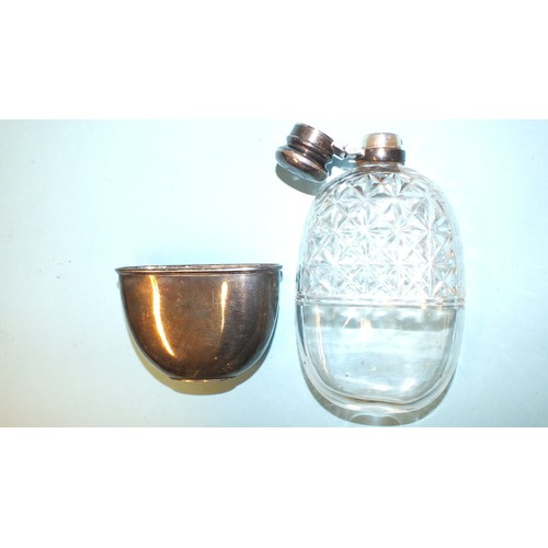 546 - A Victorian silver-mounted cut-glass hip flask, of oval form, with locking cap and removable silver ... 