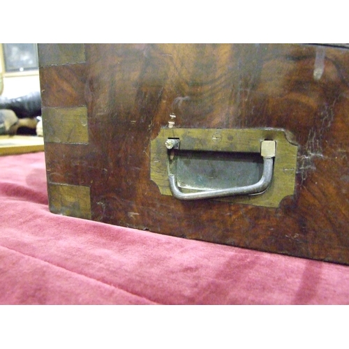 181 - A Victorian brass-bound walnut writing slope with fitted interior, including candle sconces and 'pop... 