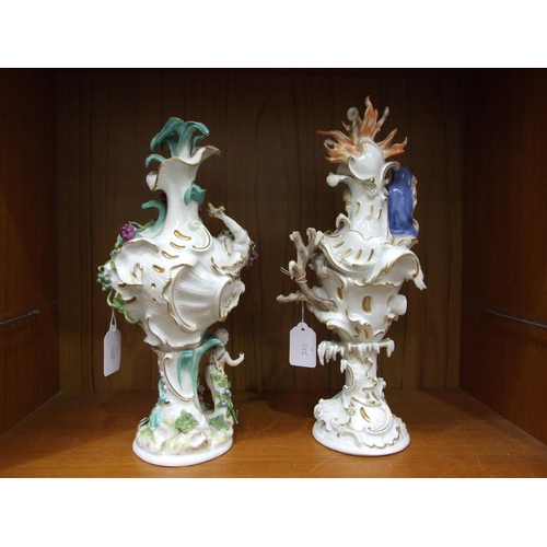 225 - A matched group of four 18th century Meissen vases emblematic of the seasons, 33cm high, crossed swo... 