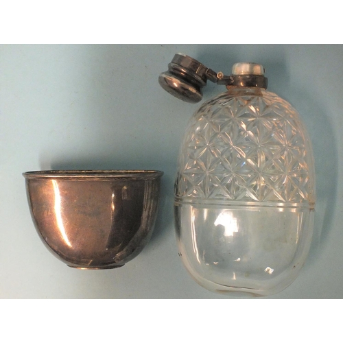 546 - A Victorian silver-mounted cut-glass hip flask, of oval form, with locking cap and removable silver ... 