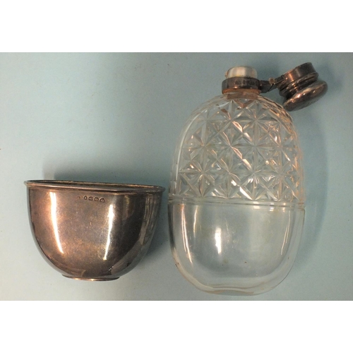 546 - A Victorian silver-mounted cut-glass hip flask, of oval form, with locking cap and removable silver ... 