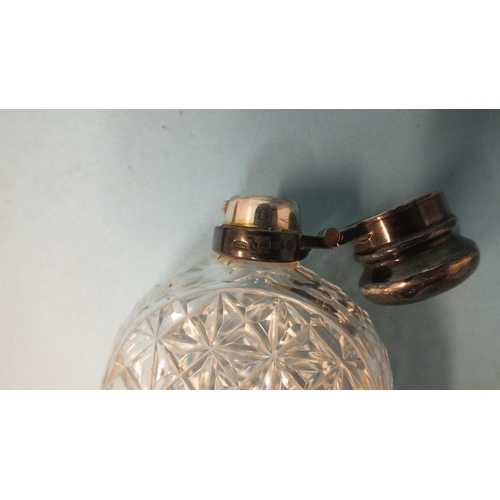 546 - A Victorian silver-mounted cut-glass hip flask, of oval form, with locking cap and removable silver ... 