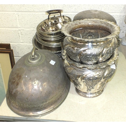 101 - A pair of silver-plated Britannia metal wine coolers embossed with flowers, by Walker & Hall, 19... 