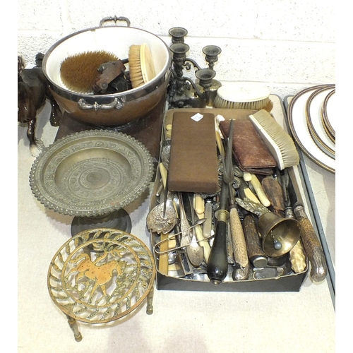 103 - A collection of plated cutlery, including horn-handled carving knife and fork, a brass tazza, the ci... 