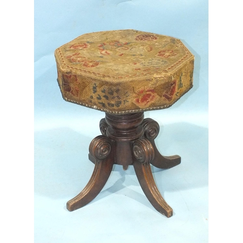 78 - An early-19th century mahogany music stool, the revolving adjustable seat, with original needlework ... 