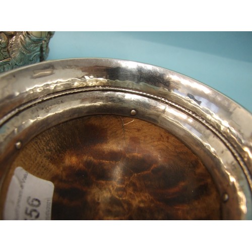 556 - Omar Ramsden, a silver-mounted mazer bowl, the circular wood body with hammered silver rim mount pie... 