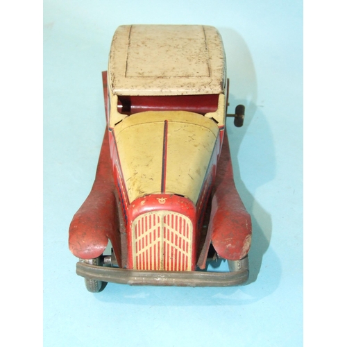 431 - A Mettoy tinplate c/w limousine with cream and red body and 'Dunlop 90' balloon tyres, 27cm long, (s... 