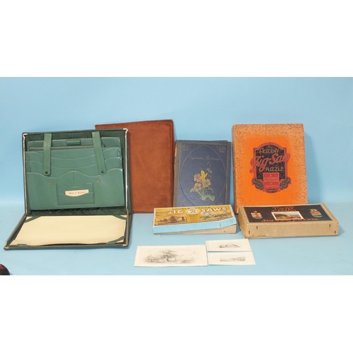 440 - Two wooden jigsaws, (one complete), an album of cigarette cards, two leather stationery folders and ... 