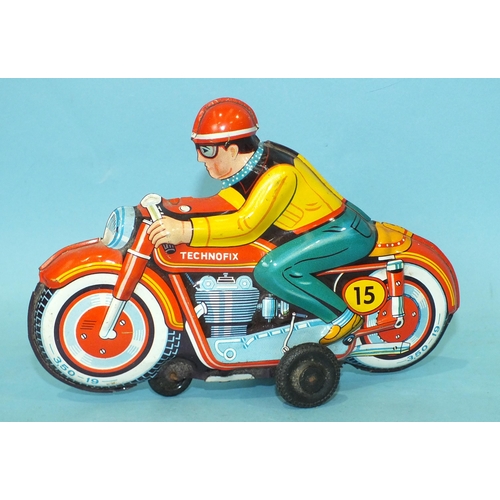 443 - A Technofix tinplate racing motorcycle, 3.50-19, RN15, c1970's.