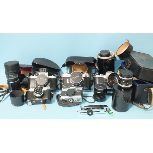 463 - A quantity of 35mm SLR film cameras: Pentax Asahi S1a (x2), Canon FX, Rollei B35 and PalJR, four len... 