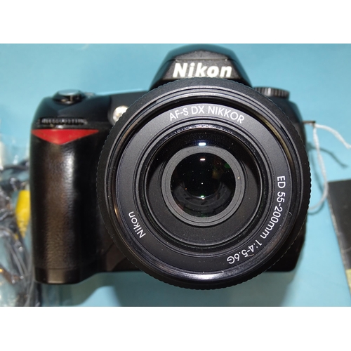 469 - A Nikon D70 DSLR camera, with AF-S Nikkor 55-200mm f4-5.6 GED lens, battery (plus spare), charger, c... 