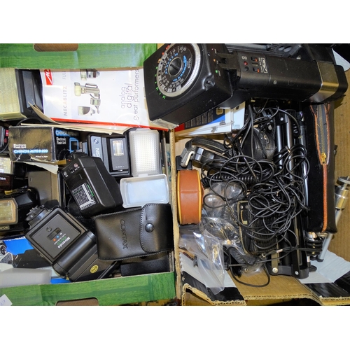 478 - A quantity of flash units, light meters, tripods, etc.