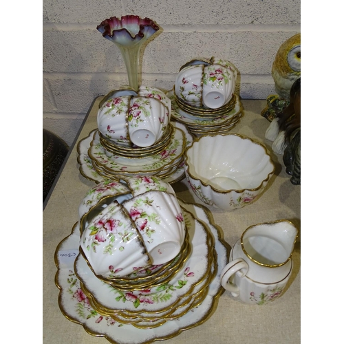 73 - Forty pieces of a late-19th/early-20th century tea set, with gilt, pink and green floral decoration ... 