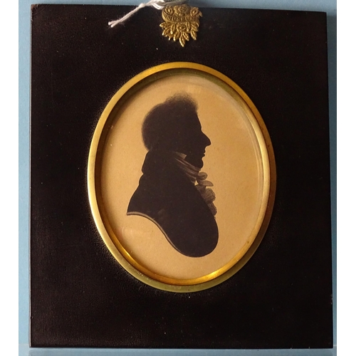 120 - William Alport, (fl.1830), an early-19th century painted silhouette on card of an unknown gentleman,... 