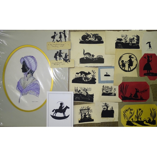 122 - A scissor-cut silhouette scene of farm workers and hay cart, 190 x 90mm and other smaller cut silhou... 