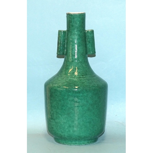 196 - A 19th century Chinese porcelain arrowhead-shaped vase covered in a green crackle glaze, one handle ... 