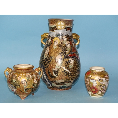 202 - A 19th century Japanese Satsuma vase decorated with immortals, 19cm high and two smaller vases, (3).... 