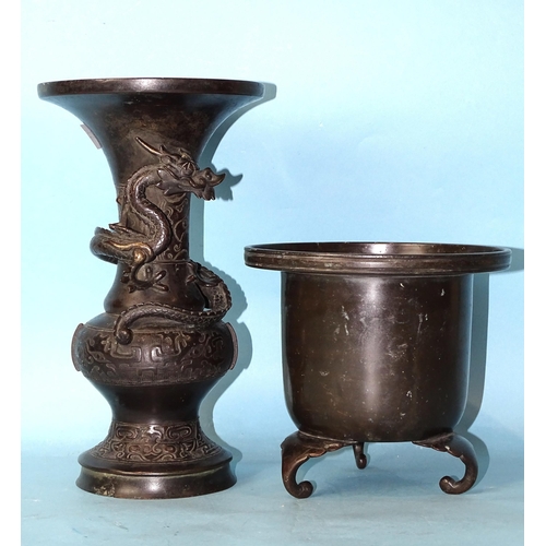 209 - A 19th century Japanese bronze tripod censer and a bronze vase of baluster form with an applied drag... 