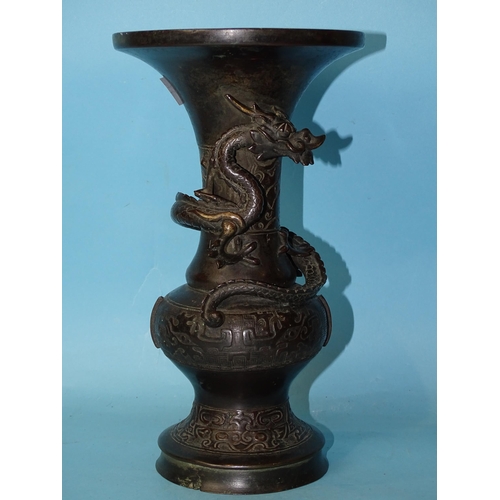 209 - A 19th century Japanese bronze tripod censer and a bronze vase of baluster form with an applied drag... 