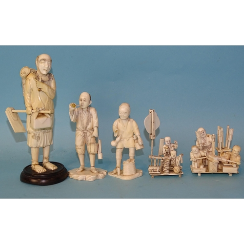 213 - A Japanese ivory standing wood-cutter, a man smoking a pipe and three other small ivory groups, Meij... 