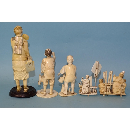 213 - A Japanese ivory standing wood-cutter, a man smoking a pipe and three other small ivory groups, Meij... 