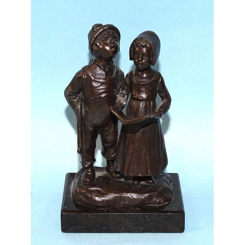 220 - Julius Paul Schmidt-Felling (1835-1920), a bronze figure group of a young boy and girl singing, the ... 