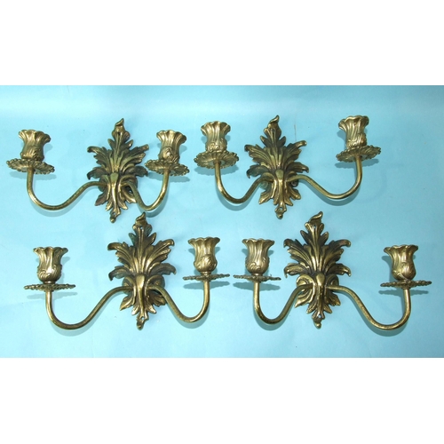 224 - A set of four reproduction gilt metal wall candle sconces with foliage decoration, 17cm high, 27cm w... 