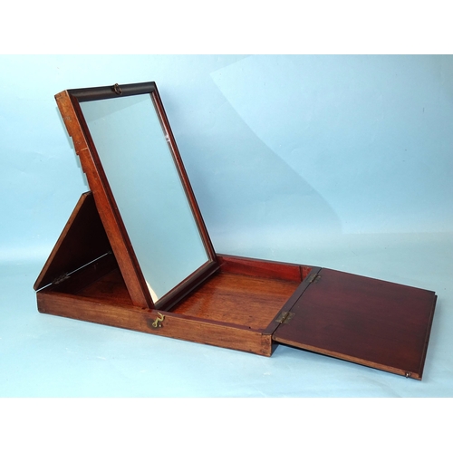 234 - An early-19th century mahogany travelling mirror, the rectangular folding case revealing a moulded f... 