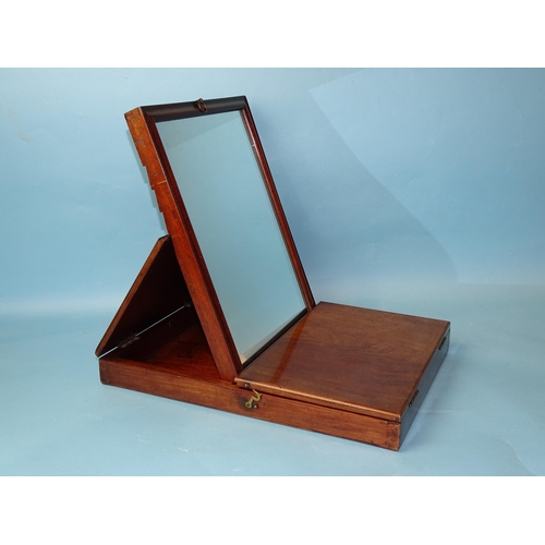 234 - An early-19th century mahogany travelling mirror, the rectangular folding case revealing a moulded f... 