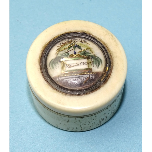 236 - A small circular bone patch box, the lid with Nelson memorial vignette, 2.5cm diameter.... 