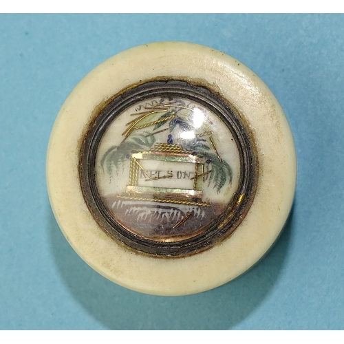 236 - A small circular bone patch box, the lid with Nelson memorial vignette, 2.5cm diameter.... 