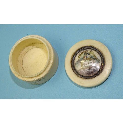 236 - A small circular bone patch box, the lid with Nelson memorial vignette, 2.5cm diameter.... 