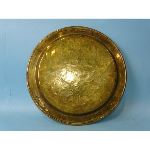 246 - A Damascus 'Cairo ware' circular brass plate with white metal and copper inlaid decoration, 29cm dia... 