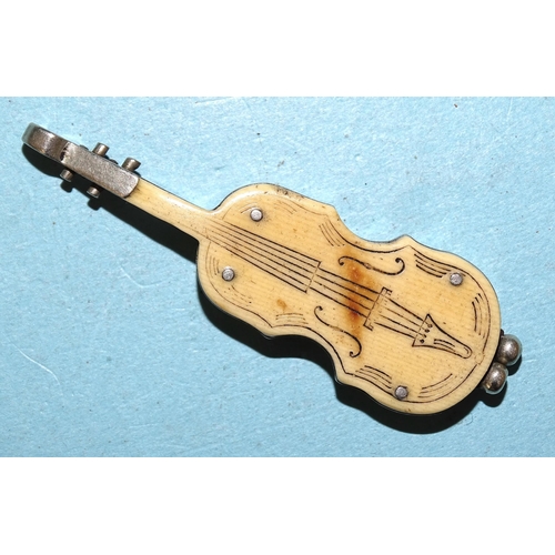 252 - A novelty steel and ivorine 'violin' fob cheroot cutter, 7cm long open, 5.5cm closed.... 