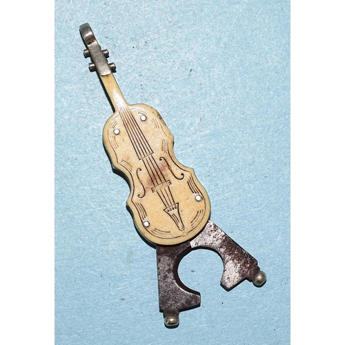 252 - A novelty steel and ivorine 'violin' fob cheroot cutter, 7cm long open, 5.5cm closed.... 