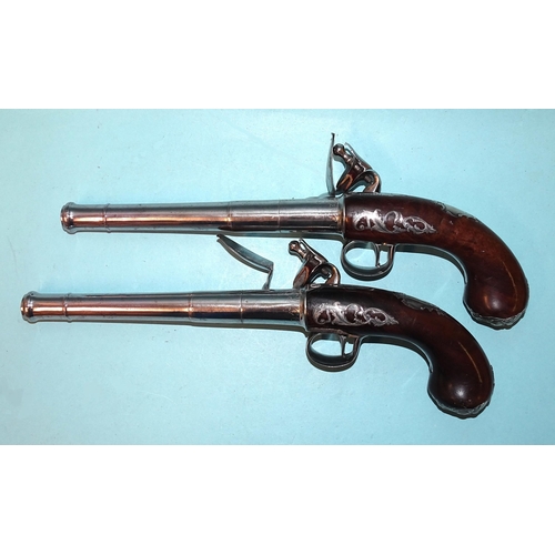 255 - A pair of 18th century flintlock cannon-barrelled pistols by Pounce, London, each with torn-off barr... 