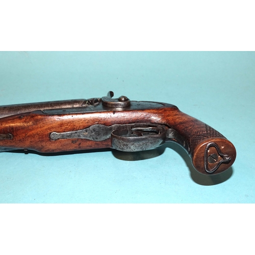 257 - A 19th century percussion double-barrelled pistol with 12cm barrels and walnut stock, 23cm overall a... 