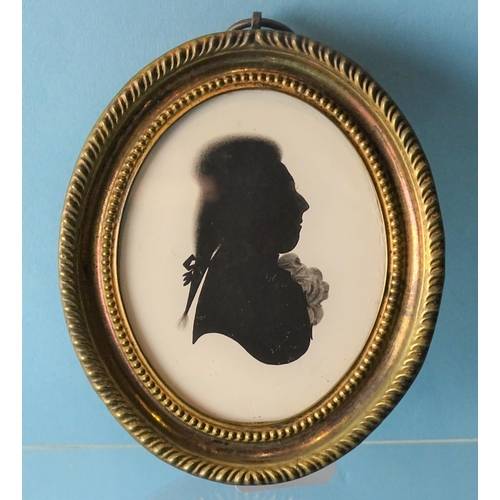 95 - Mrs Mary Lightfoot (1750-1837), a late-18th century painted silhouette on plaster of an unknown man,... 