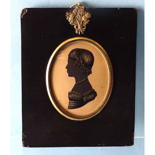 97 - Dillon of Dock, (fl. 1810-1844), an early-19th century cut silhouette on card, embellished in gold a... 