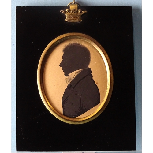 99 - J H Gillespie (fl.1810-1838), an early-19th century painted silhouette on card of an unknown man, in... 