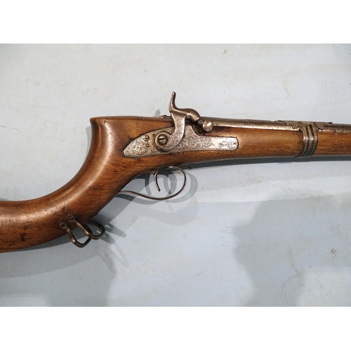 256 - A Middle-Eastern percussion jezail rifle with engraved lock, hammer and trigger guard, the 97cm barr... 