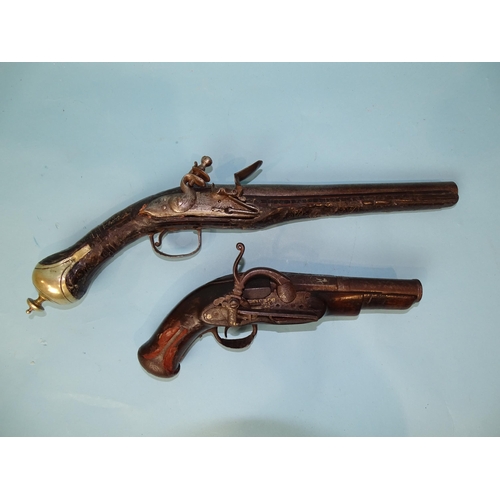 777 - A Turkish flintlock duelling pistol and a converted miquelet belt pistol, the 13.5cm two-stage barre... 