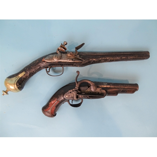 777 - A Turkish flintlock duelling pistol and a converted miquelet belt pistol, the 13.5cm two-stage barre... 