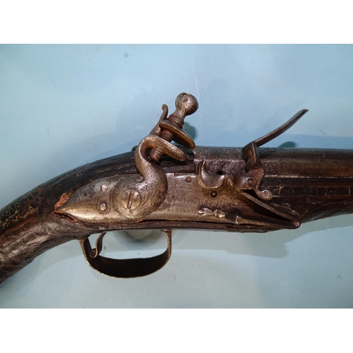 777 - A Turkish flintlock duelling pistol and a converted miquelet belt pistol, the 13.5cm two-stage barre... 