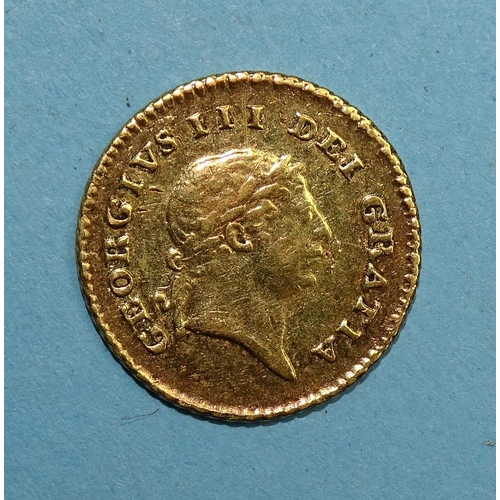 325 - A George III 1810 gold third-guinea.