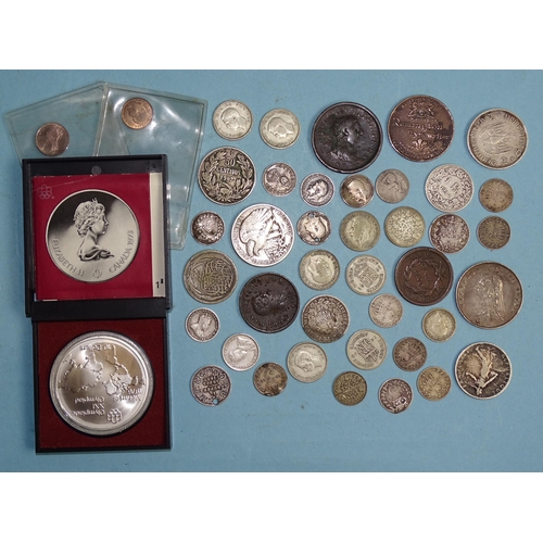 340 - A collection of British and world coinage, including a quantity of silver coins and a Danbury Mint S... 