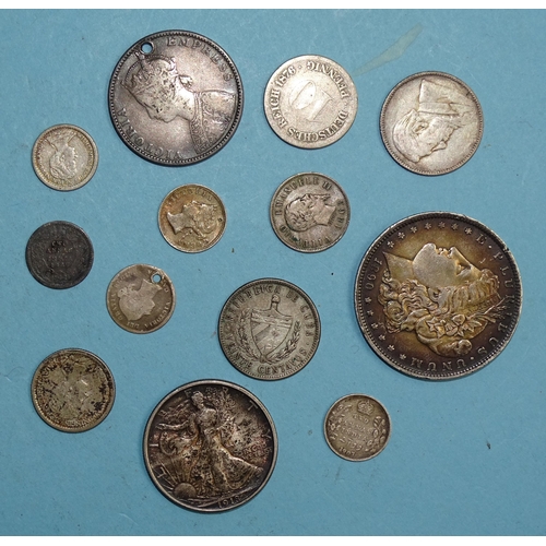 341 - A USA 1890 Morgan silver dollar, New Orleans Mint, a 1918 half-dollar and other silver world coinage... 